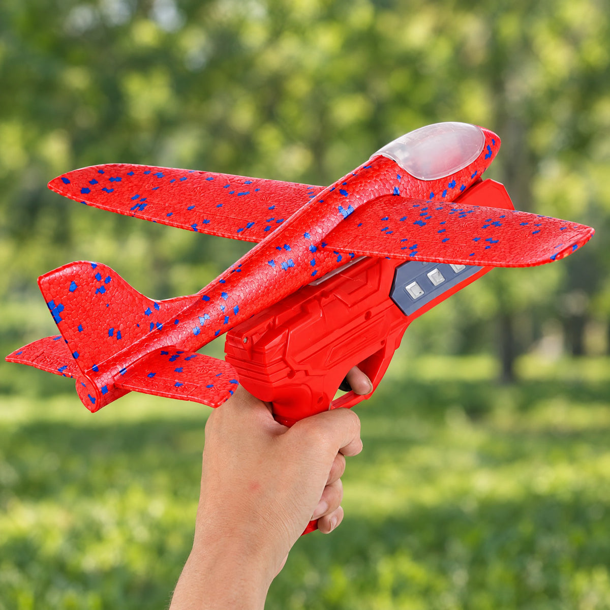 ORBITER red foam glider and launcher held in hand