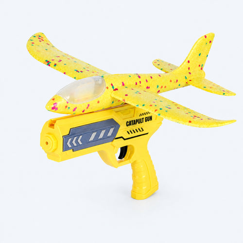 ORBITER yellow foam glider and yellow launcher — studio view